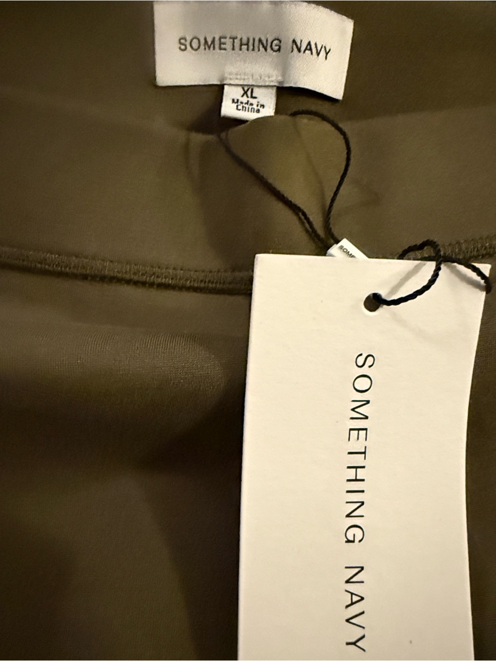 Something Navy Cropped Ponte leggings. In Olive Brown.